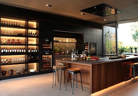 Modular kitchen in Tricity with smart storage solutions, tall units, soft-close drawers, corner cabinets, and modern finishes for efficient and organized home interiors.