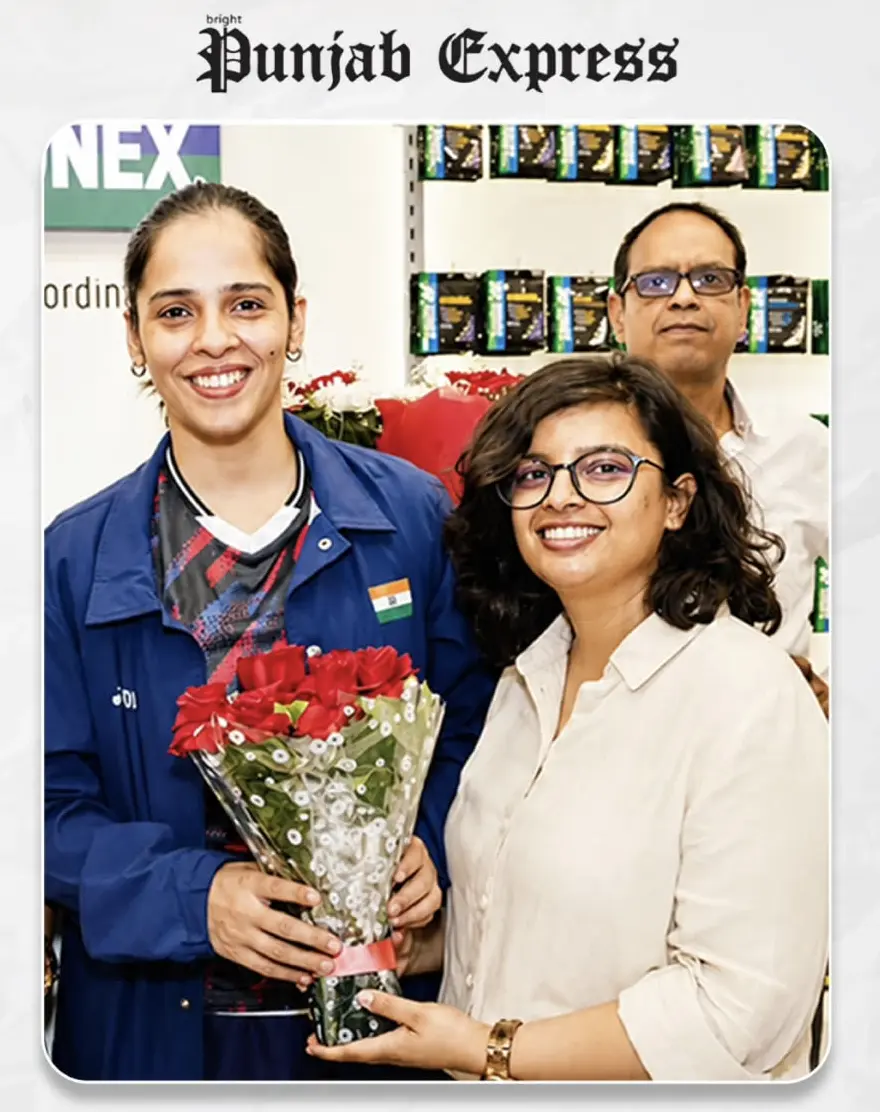 Saina Nehwal presenting flowers to Aarzoo Bansal, founder of Aryelia Design Studio — luxury interior designer Tricity